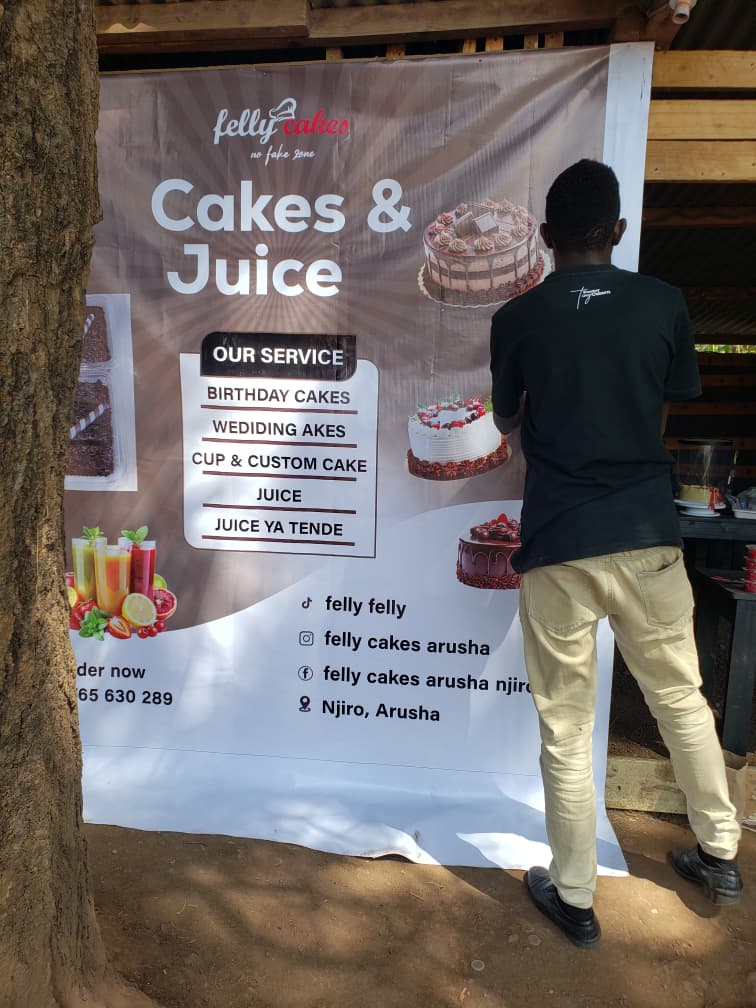 Felly Cakes and Juice Storefront Wall Banner in Njiro Arusha by G DESIGN